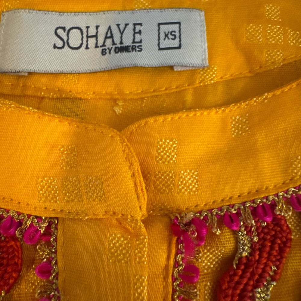 Yellow Blouse with Pink Embellishments